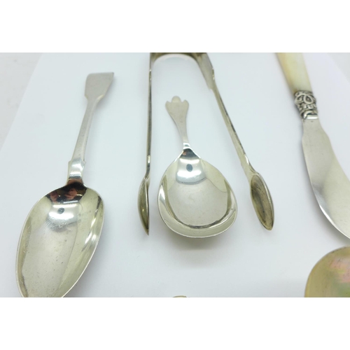 810 - A pair of Victorian silver sugar bows by George Adams, one other silver pair, two silver spoons, a s... 