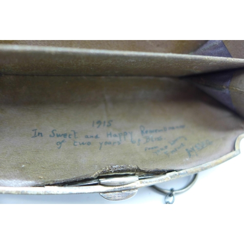 828 - A silver purse, Birmingham 1915, a/f, dented