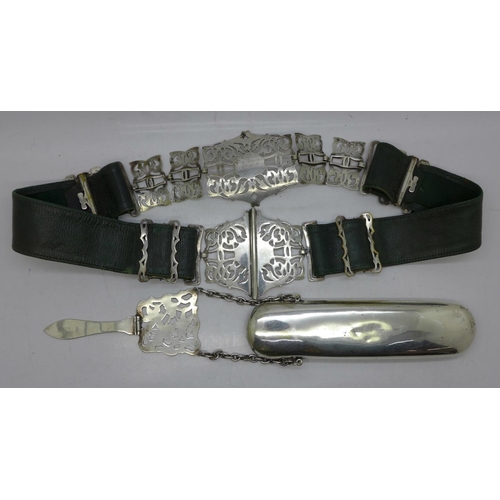 832 - A plated Edwardian Art Nouveau spectacle holder with chatelaine clip and a plated belt