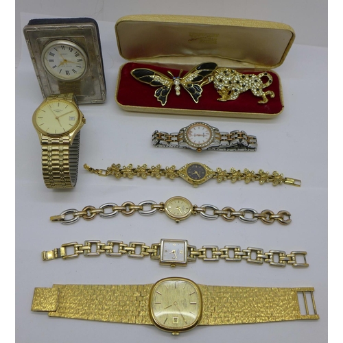 841 - A small silver fronted clock, lady's and gentleman's wristwatches, including three Rotary, and two b... 