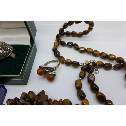 866 - Tiger's eye jewellery including silver ring and earrings