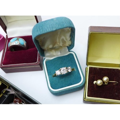 872 - A collection of silver jewellery; earrings, pendant, rings and brooches