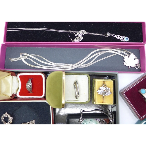 872 - A collection of silver jewellery; earrings, pendant, rings and brooches