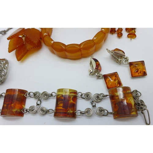 873 - Amber jewellery; brooches, rings, pendants, bracelet, etc.