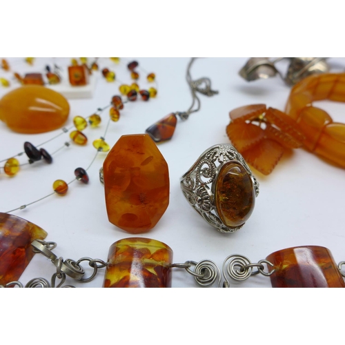 873 - Amber jewellery; brooches, rings, pendants, bracelet, etc.