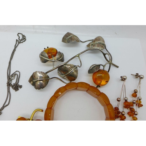 873 - Amber jewellery; brooches, rings, pendants, bracelet, etc.