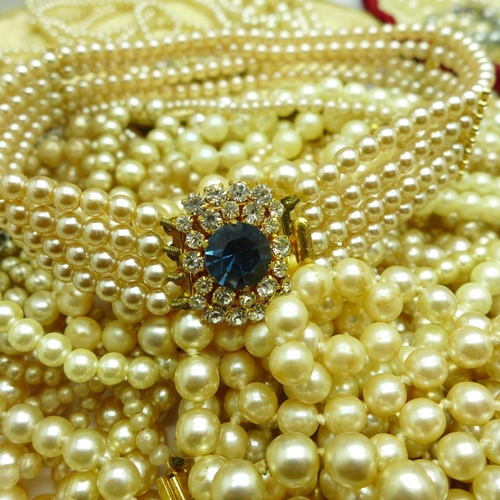 887 - A quantity of faux pearl jewellery, some boxed