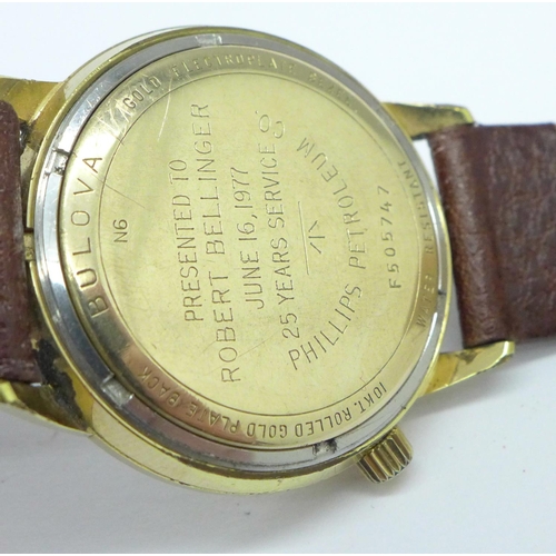 893 - A gentleman's Bulova Accutron gold plated wristwatch with inscription dated 1977, 'Phillips Petroleu... 