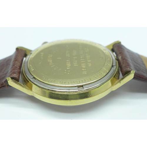 893 - A gentleman's Bulova Accutron gold plated wristwatch with inscription dated 1977, 'Phillips Petroleu... 