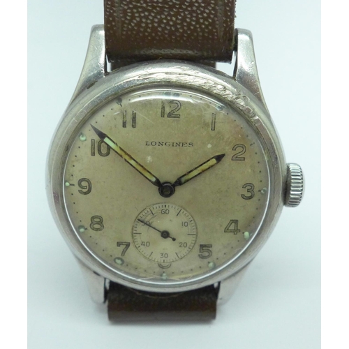 898 - A gentleman's Longines wristwatch, dating to 1944, 30mm case