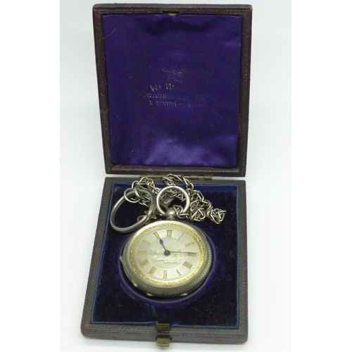 915 - A silver fob watch with engraved landscape on dial, fitted case