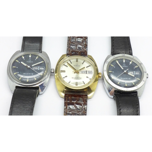 942 - Three gentleman's Timex Quartz wristwatches