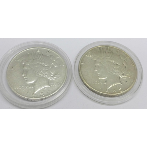 955 - Two US $1 coins, 1923 and 1934