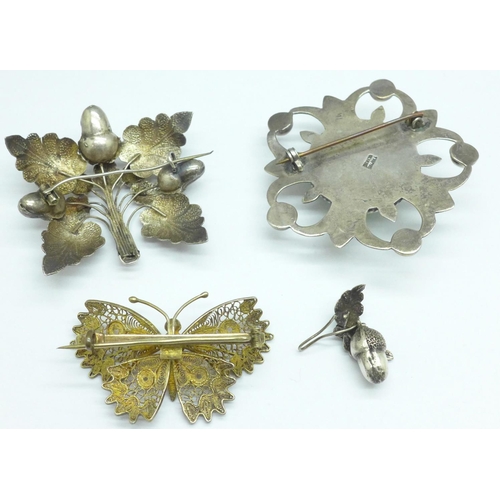 993 - Three silver brooches and a single earring