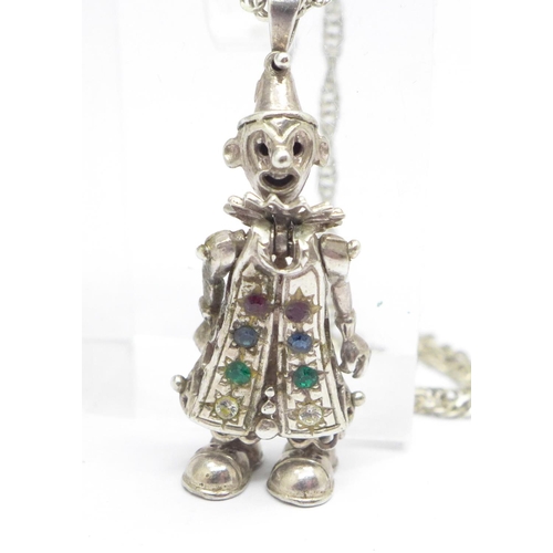 998 - A silver articulated clown pendant and chain