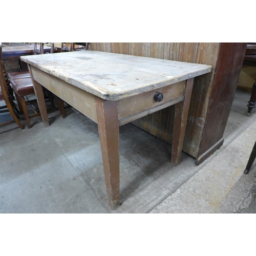 223 - A pine single drawer kitchen table