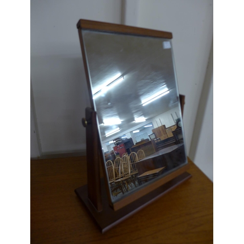 100 - A teak toilet mirror and two other teak mirrors