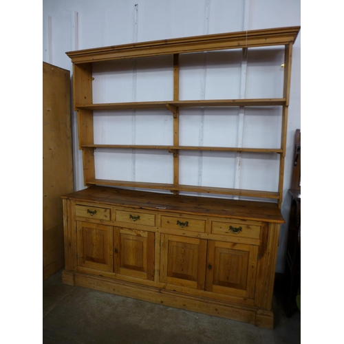 178 - A pine dresser and a pine Delft rack