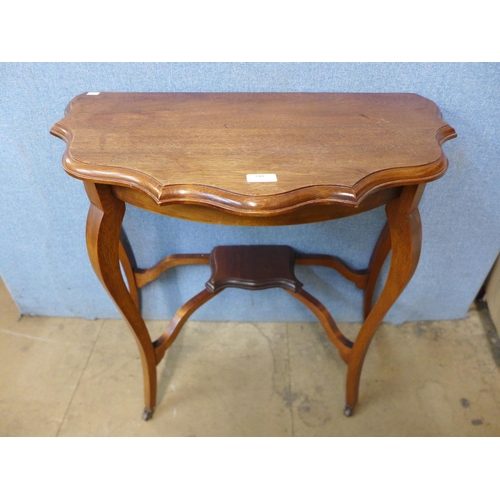 240 - An American beech rocking chair and an Edward VII mahogany side table