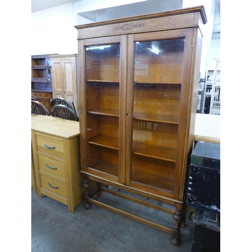 243 - An oak two door bookcase