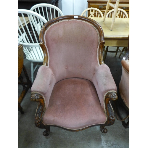 250 - A Victorian carved walnut and upholstered armchair