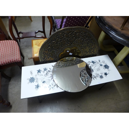 265 - A 1960's coffee table, teak and tiled nest of tables, mirror and a brass charger