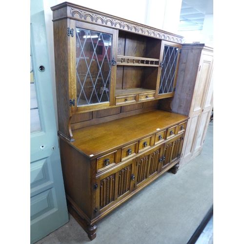 268 - A carved oak dresser