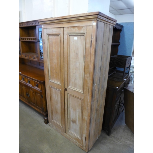 269 - A pine two door cupboard