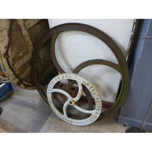 279 - Two industrial cast iron wheels