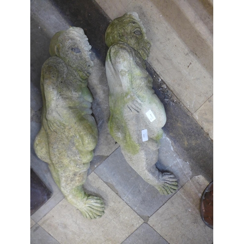 292 - A pair of concrete architectural grotesque figures