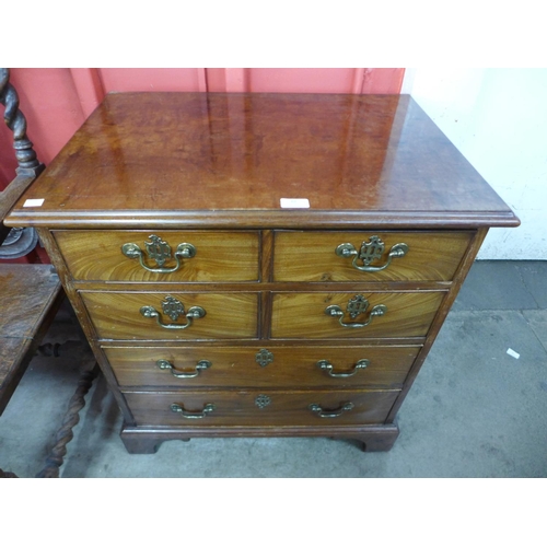 62 - A George II style mahogany bachelor's chest of drawers