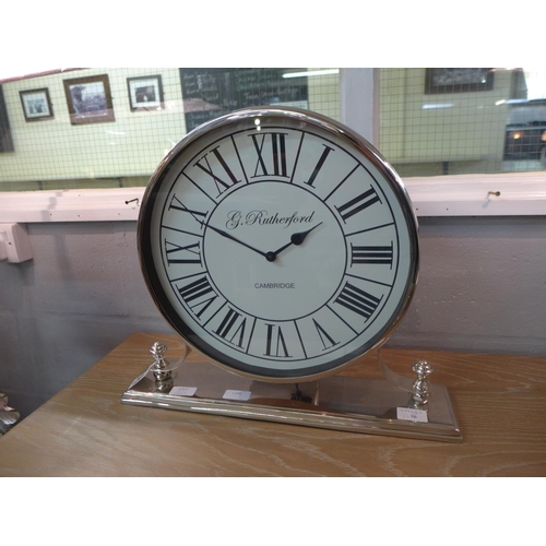 1386 - A circular nickel table clock (IND833)   #