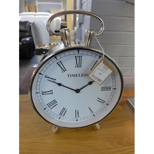 1513 - A circular chrome table clock with loop handle (1754225)   #