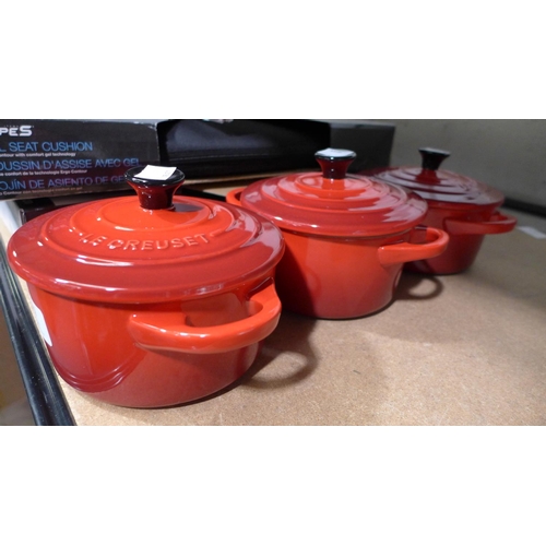 3222 - Three small Le Creuset Round Cocottes Stoneware   303810/249  *This lot is subject to vat