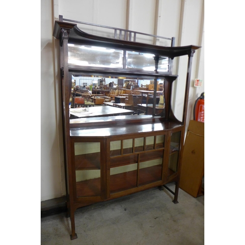 120 - An Arts and Crafts mahogany side cabinet