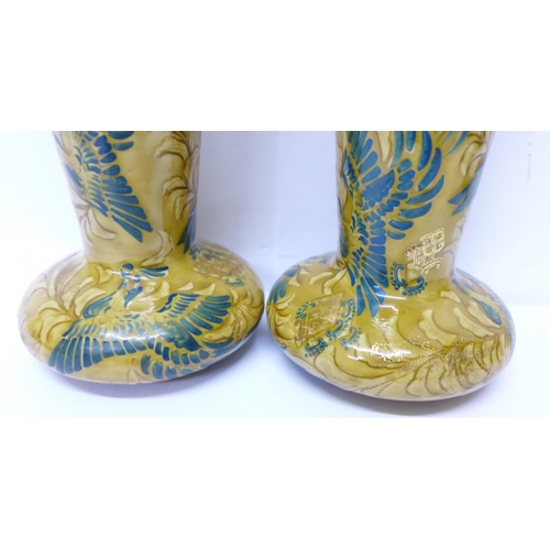 608 - A pair of Doulton Lambeth Art Nouveau vases, circa 1890-1900, decorated with phoenix in foliage, A. ... 