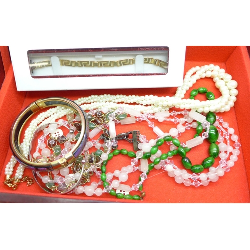 672 - A jewellery box and contents including Florenza stone set bracelet, etc.