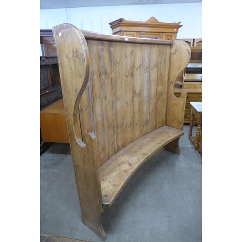 106 - A 19th Century style pine bacon settle