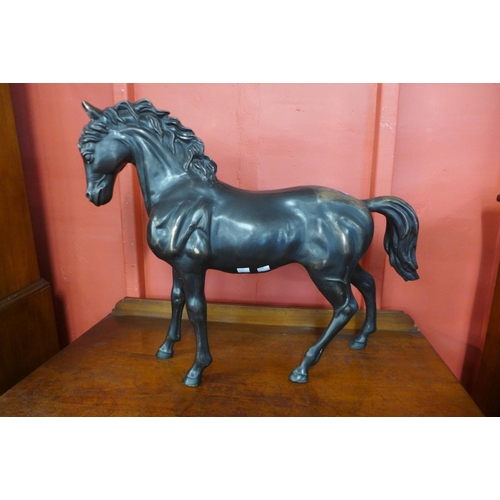117 - A large bronze figure of a stallion