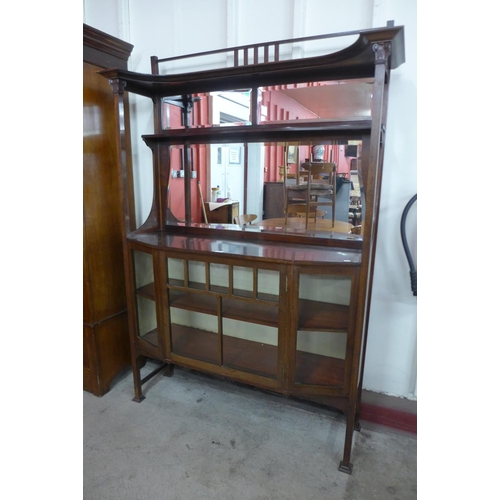 120 - An Arts and Crafts mahogany side cabinet
