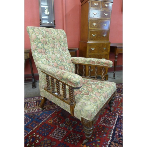 86 - A Victorian walnut and upholstered armchair