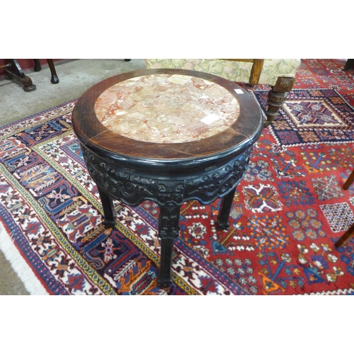 90 - A 19th Century Chinese carved rosewood and marble topped jardiniere stand