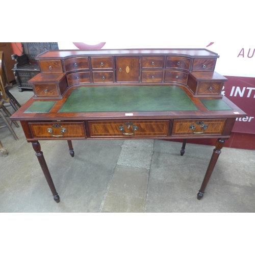 92 - An inlaid mahogany Carlton House style desk