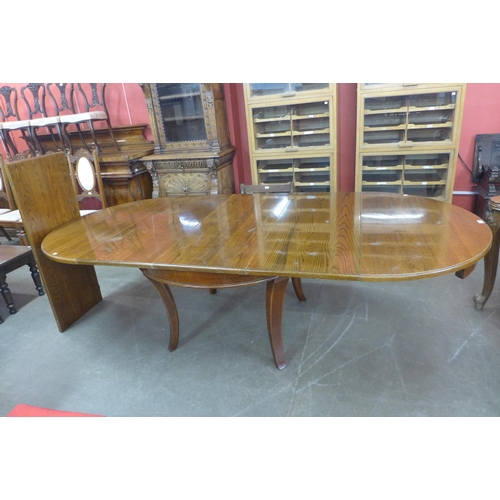 98 - A 19th Century oak extending dining table