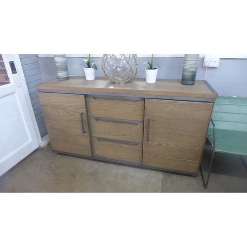 1318 - A three drawer two door Clumber sideboard