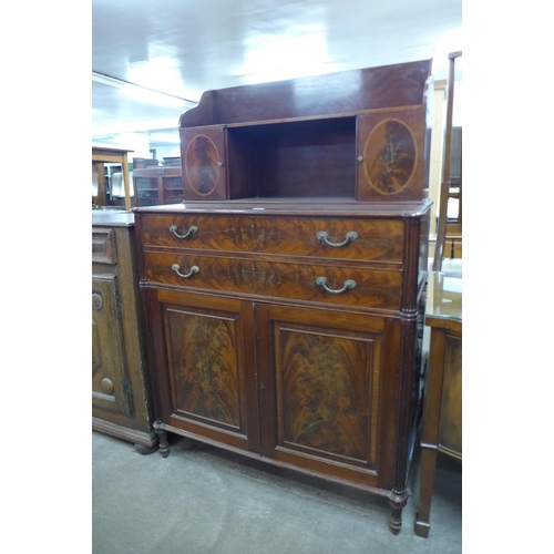 148 - A Regency style inlaid mahogany side cabinet