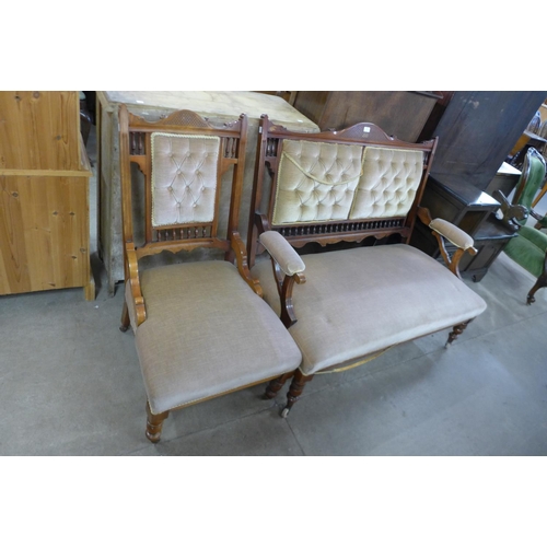 201 - A Victorian mahogany and upholstered two piece salon suite