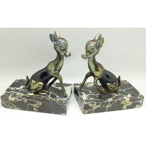 601 - A pair of Art Deco spelter 'Bambi' book ends on a marble base