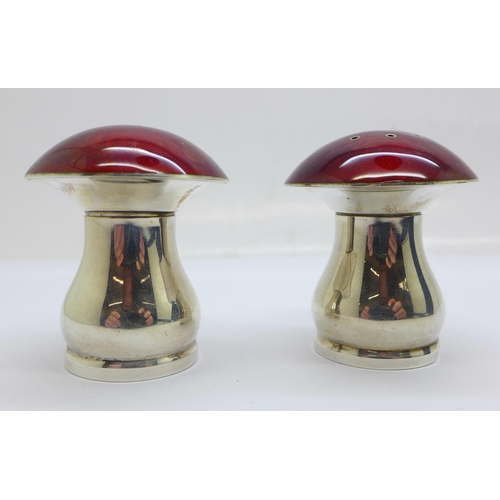 737 - A Danish silver and cherry coloured guilloche enamel novelty toadstool shaped salt and pepper set, b... 