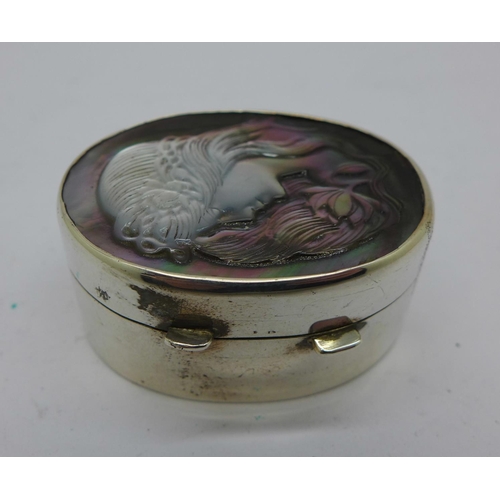 779 - A hallmarked silver pill box set with a cameo